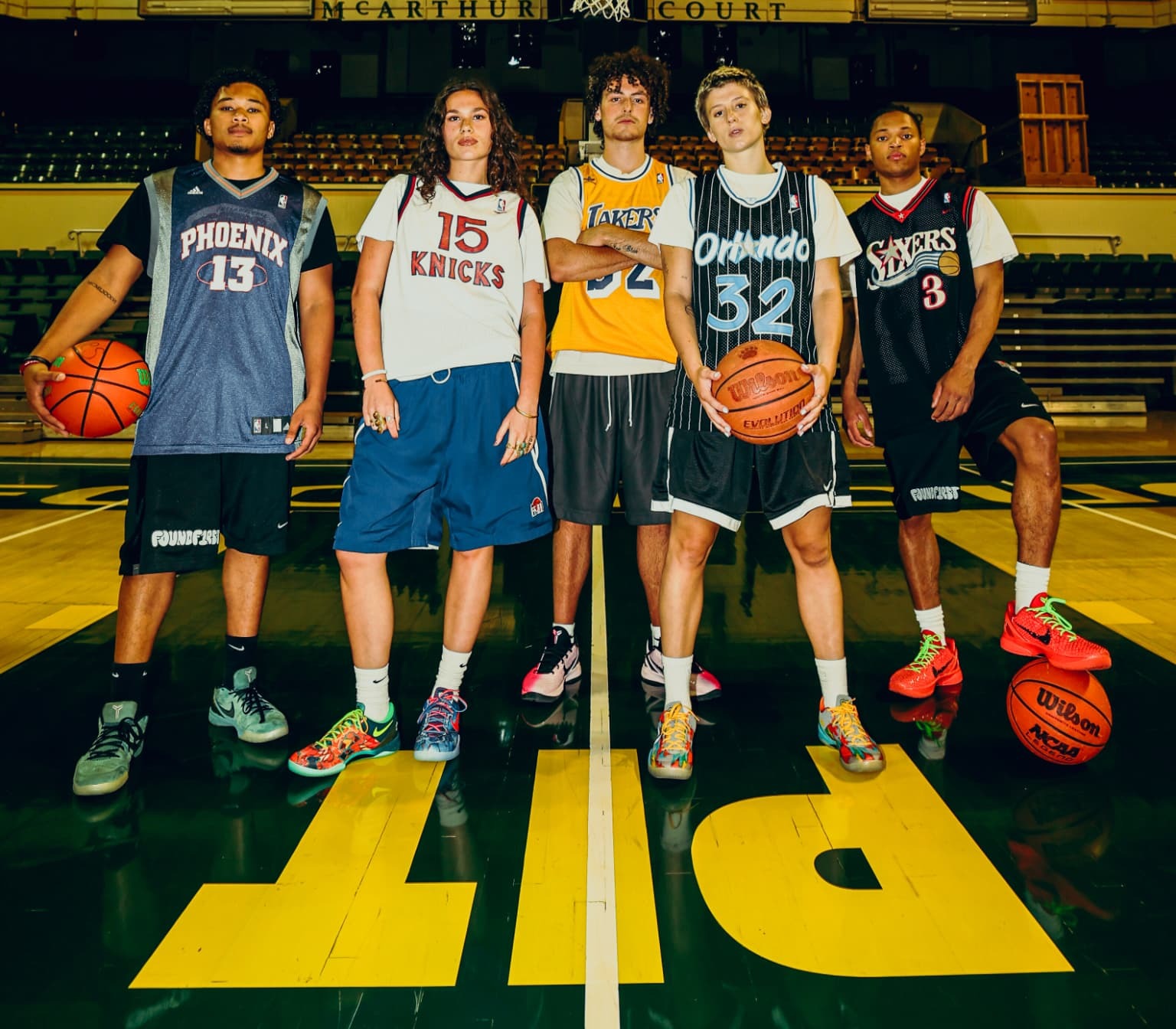 FoundF1rst crew wearing vintage basketball jerseys on the court