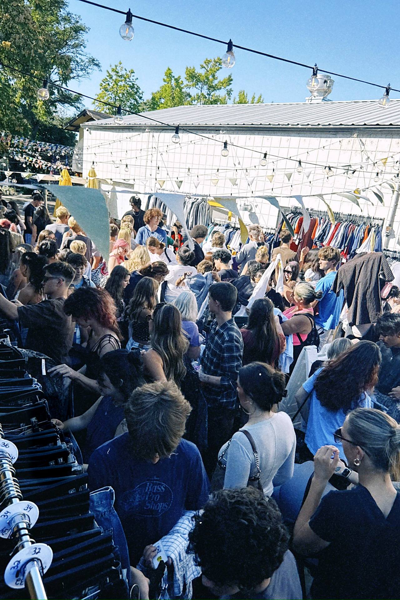 Crowd digging through the racks at a FoundF1rst pop-up